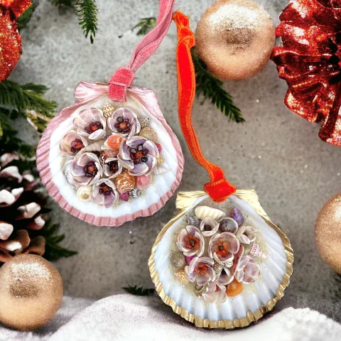 Clam shells filled with glue sand and miniature shells and gems.